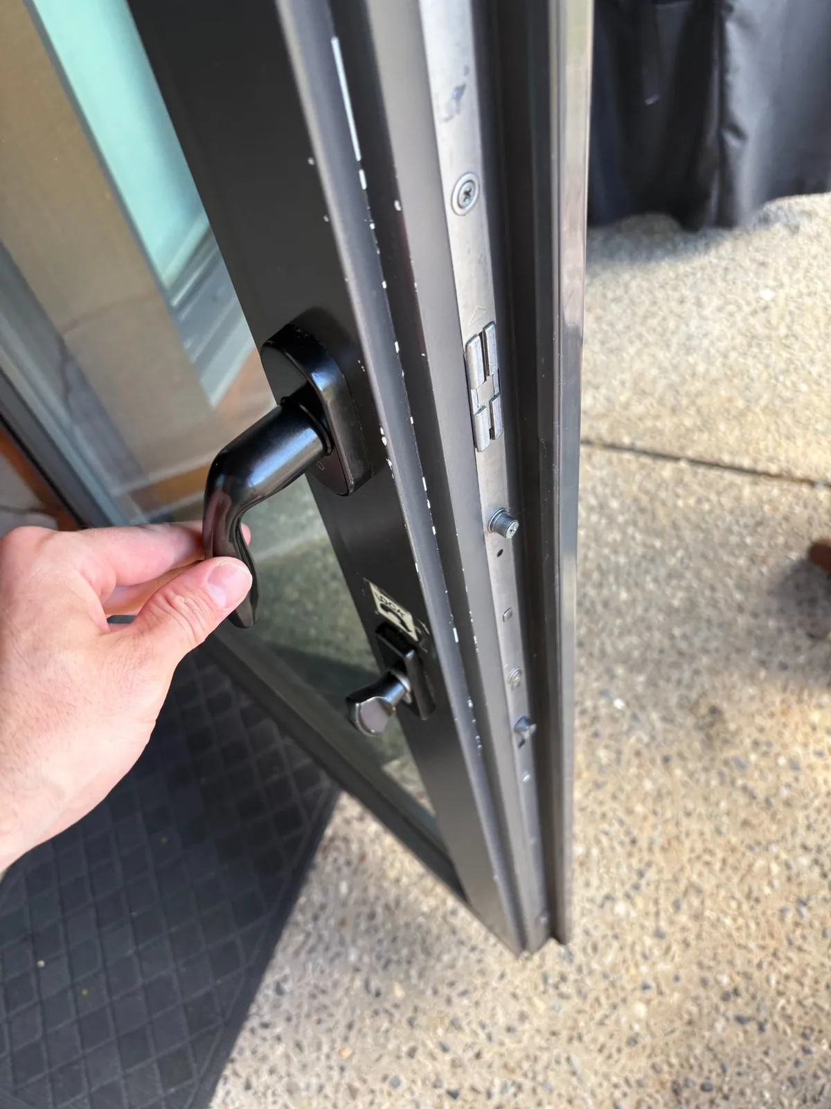 Patio door lock repair in progress