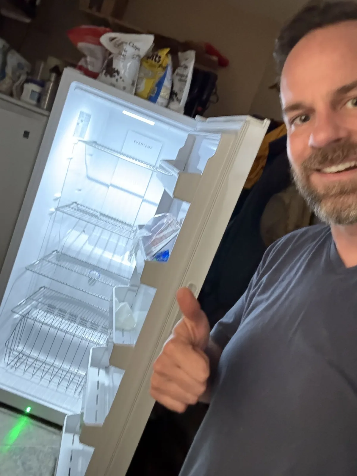 Refrigerator repair in progress